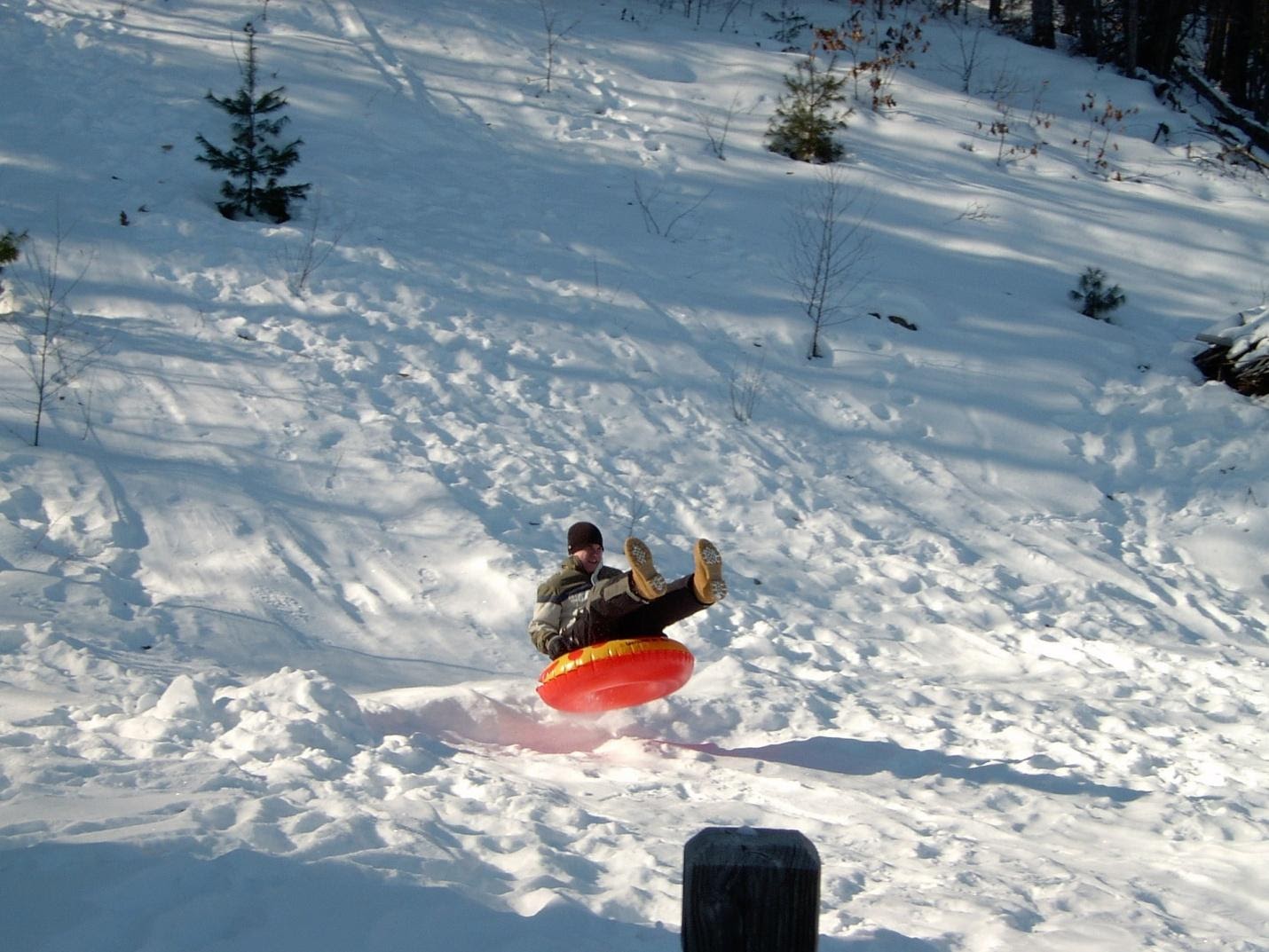 A man sliding in ice slope